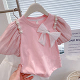 Girls Modern Princess 2Pc Puff Sleeve Top & Puff Skirt Set. Adorned With Bow and Streamer Pearl Shoulder accents.